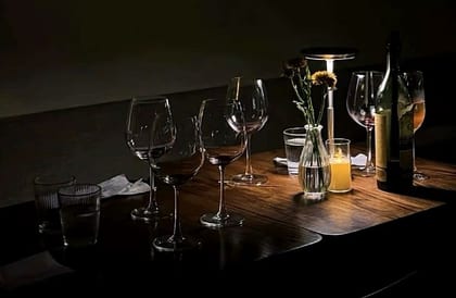 A candlelit wine table at Luna